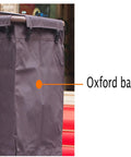 Oxford bag detail on Straight Up Heavy Duty Three Tier Cleaning Cart With Two Roomy Cabinets And Smooth Rolling Wheels For Hotel Housekeeping Hustle Sturdy Painted Iron Frame Top Shelf Lid And Nifty Side Pocket Storage In Brown.