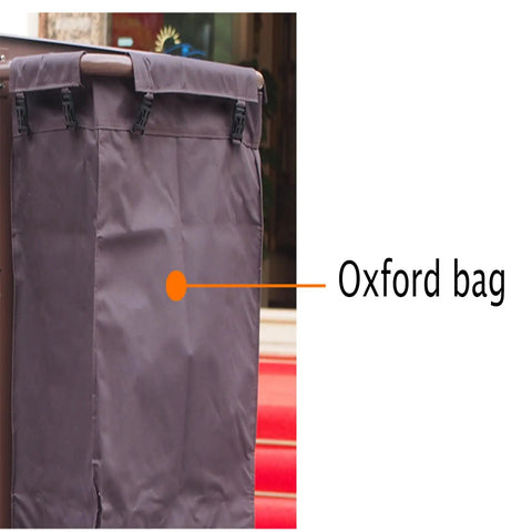 Oxford bag detail on Straight Up Heavy Duty Three Tier Cleaning Cart With Two Roomy Cabinets And Smooth Rolling Wheels For Hotel Housekeeping Hustle Sturdy Painted Iron Frame Top Shelf Lid And Nifty Side Pocket Storage In Brown.