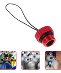 Red Threaded Diving Tank Valve Protector Cap With Cord Dust Plug Cover For Scuba Gear displayed with scuba tanks
