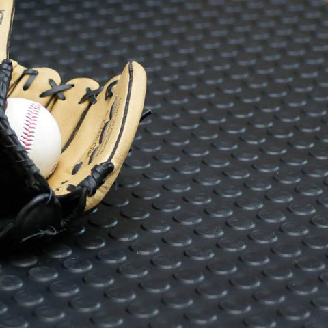Baseball glove and ball on Coin Pattern Rubber Flooring 3.5mm Thick 36 Inch By 10 Foot Sheet Dark Gray No Slip Surface For Garage And Shop