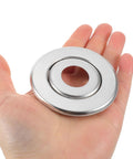 18 Pack Rock Solid Metal Fire Sprinkler Trim Rings Heavy Duty Escutcheon Plates Silver held in hand showcasing size and design.