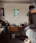 Funny First Aid Kit Metal Sign 8x12 Aluminum Wall Decor in an office workspace beside a bunk bed.