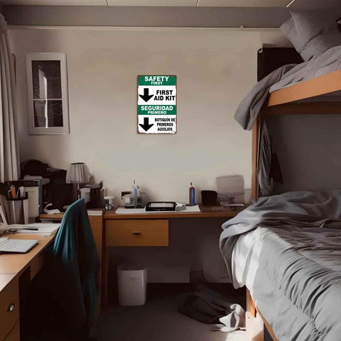 Funny First Aid Kit Metal Sign 8x12 Aluminum Wall Decor in an office workspace beside a bunk bed.