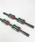 Two Pack HGR20 Square Linear Guide Rails With Four HGH20CA And HGW20CC Block Carriages For CNC Router Engraving And Precision Motion Devices, 500mm Rails, Pro Grade Smooth Operation, Low Backlash And Durable Build. HGR20 rail and block carriages on white background