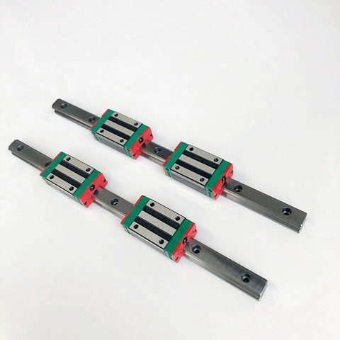Two Pack HGR20 Square Linear Guide Rails With Four HGH20CA And HGW20CC Block Carriages For CNC Router Engraving And Precision Motion Devices, 500mm Rails, Pro Grade Smooth Operation, Low Backlash And Durable Build. HGR20 rail and block carriages on white background