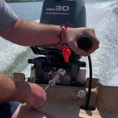 Adjustable Manual Boat Jack Plate For Up To 30HP Outboard Motors High Grade Marine Aluminum Construction Fastest Manual Jack Plate On The Market Raise And Lower In Seconds On Demand On Water Adjustability For Quick Smooth Motor Positioning used in a boat on the water.