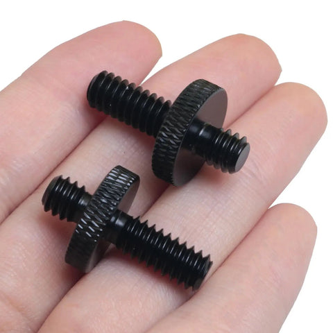 Heavy Duty Aluminum 1/4 Male To 1/4 Male Extended Tripod Adapter Screws With Smooth Quick Release Build For Killer Camera Rig Setups And Secure Video Mounting 2 Pack in hand.