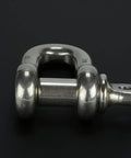 Rock Solid 1/2 Inch Chain Shackle Clevis Bow Ring Forged From Saltwater Proof 316 Stainless Steel For Heavy Duty Sailboat Rigging And Bulletproof Moused Pin Setup, close-up view.