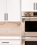 Thirty Pack Four Inch Hole Center Cabinet Pulls Matte Black Finish Six And Three Eighths Inches Overall Length kitchen hardware on cabinets