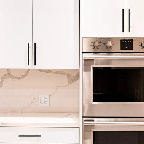 Thirty Pack Four Inch Hole Center Cabinet Pulls Matte Black Finish Six And Three Eighths Inches Overall Length kitchen hardware on cabinets