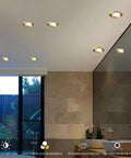 Top Shelf 15 Piece Set Of Sleek Black Brass Led Recessed Ceiling Lights Offering Flawless 3000K To 6000K color shifts in bathroom.