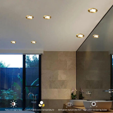 Top Shelf 15 Piece Set Of Sleek Black Brass Led Recessed Ceiling Lights Offering Flawless 3000K To 6000K color shifts in bathroom.