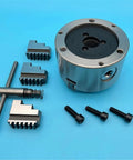 Solid K11-100 Mini 100MM Lathe Chuck With Three Self Centering Jaws for Metalworking Projects with accessories and screws.