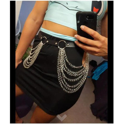 Edgy Layered Belly Chain Made From Distressed Leather And Antique Alloy Links A Universal Fit, styled over a black skirt.