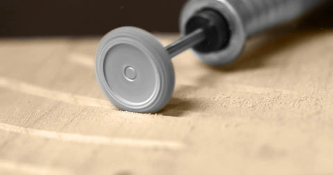 Close-up of Extreme Rotor Saw Burr cutting wood, showing rapid material removal with tungsten carbide tool for Dremel RSX-34-EC.