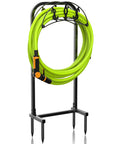 Freestanding Garden Hose Holder With 4 Spikes Heavy Duty Hose Reel Keeps 150 Ft Of Hose Neatly Stored, shown with coiled green hose.