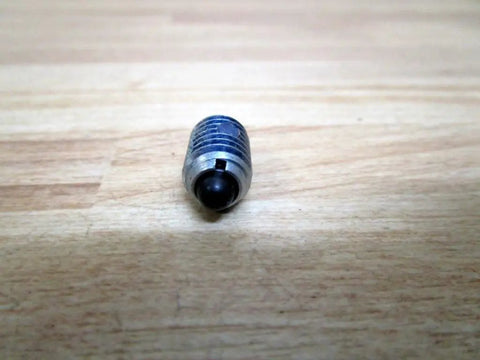 Workhorse Stubby Plunger Kit With 5/8 Inch Npt Ports Solid Steel Body close-up of hydraulic punch tool component on wooden surface