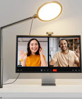 10.2 Inch Ring Light With Stand For Desk Setup 360 Degree Rotating Arm C Clamp Mount used during a video call on computer monitor.