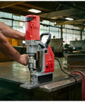 Person operating a Heavy Duty Magnetic Drill Kit With Badass 13 Amp Motor And Hella Strong Hold On Quarter Inch Steel for precise cutting.