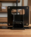 Folding Table Hinge With Automatic Locking Bracket, heavy duty metal, installed on wooden surface, space saving design.