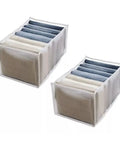 Wardrobe Upgrade Alert Killer 7 Grid Pants Organizer Box For Closet Drawer Sorter with seven neatly stacked pants.