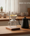 Level Up Your Morning Coffee Game With This Rock Solid Wooden Pour Over Stand Open Frame Build securely holds filter dripper and glass carafe on countertop.
