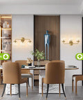 Three Light Vanity Wall Sconce Over Mirror In Matte Gold Finish With Transparent Glass Ball Shade in modern dining area.