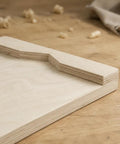 Close-up of Heavy Duty Desktop Wood Carving Jig With Killer Grip And Precision Stop made from birch plywood for whittling.