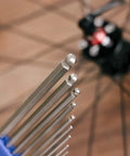 Heavy Duty Hex Allen Wrench Set For Bikes With Long Arm Ball End close-up showing precision tips and bike wheel backdrop