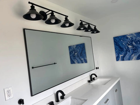 Three Light Bathroom Light Fixture With Black Metal Shade Industrial Indoor Wall Mount Sconce installed above bathroom mirror