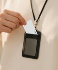 Person holding 125KHz T5577 Proximity Cards Writable Blank White CR80 Size Proximity ID Cards in black holder for access control use
