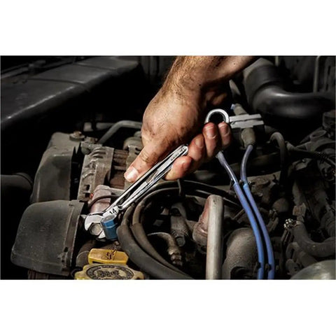 A hand using a deep socket wrench from the Kickass 191 Piece Mechanics Tool Set With Deep Socket Wrenches Ratchets Hardened Chrome Steel For Underhood Auto Repair And Garage Builds Beast Mode Workhorse on an engine.