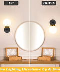Two Pack Chic Modern Wall Sconces Matte Black And Gold With Milky Glass Globe Vanity Lighting for Bathroom Bedroom Living Room Hallway Stairs Kitchen E26 Socket Easy Install, shown in up and down lighting directions.