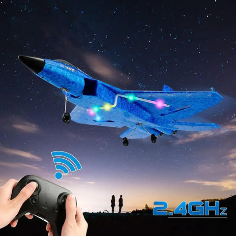 F-22 Raptor Inspired RC Plane With 2.4GHz Control, LED lights on foam glider, night sky backdrop with remote control in hand