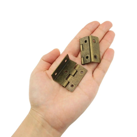 Vintage Triple Fold Cabinet Hinge With Screws Bronze Finish 36x12mm in hand showing antique iron small furniture hardware