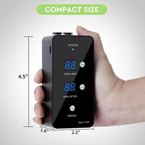 Black Reptile Humidifier Misting System For Terrariums in hand, showing dimensions and control display with buttons for operation.