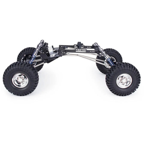 Side view of High Clearance LCG RC Crawler Chassis Kit with carbon fiber rails, portal axles, forward gearbox, and adjustable shocks for 1x10 scale.