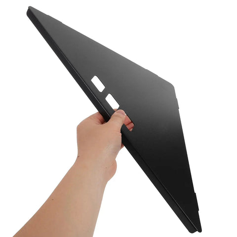 Person holding a black Stainless Steel Folding Table Corner Bracket for Camping, 90 Degree Triangle Connection Plate for stable outdoor tables.