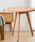 Table showcasing 4 Pack Adjustable Rubber Feet for Furniture With Screw In Design for non-slip stability on wooden floor.