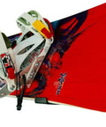 Red snowboard mounted on Heavy Duty Snowboard Wall Mount Rack For Garage Organization And Wall Storage with bindings