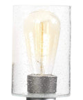 Close-up of Coastal Bath Vanity Light Two Light Fixture With Clear Seeded Glass And Galvanized Metal Finish Perfect For Seaside Vibe Bathrooms Damp Rated And Durable For Everyday Use, showing bulb detail in clear seeded glass.