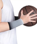 Mens Sports Wrist Guard For Weightlifting And Gym Workouts Durable Nylon Breathable Wristband on arm holding basketball