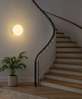 Minimalist Globe Wall Sconce, 1-Light White E27 Round Wall Light Fixture illuminating a staircase with a smooth finish.