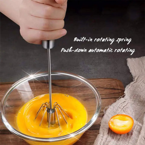 Stainless Steel Hand Push Rotary Whisk Blender Semi Automatic Kitchen Tool For Beating Eggs, Whipping Milk, Frothing Cream And Stirring, 12 Inch Durable Mixer Whisk Rod For Quick Pro Results in use, whisking eggs in a glass bowl