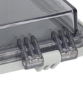 Close-up of Rugged Outdoor Electrical Junction Box with clear cover and stainless steel door lock hinge, IP67 ABS enclosure ideal for outdoor use