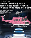 Pink RC helicopter with TOF laser height control features, showcasing hover stability in a futuristic environment.