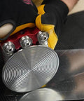 Worker using One Station Disc Bender For Sheet Metal With Large Disc Delivers Five Sixteenths To One And Three Quarters Inch Bends Curved