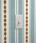 Custom Printed Vinyl Wall Covering With A Subtle Leather Look And Modern Stripe Pattern Great For Commercial Spots Or Home Hangouts close-up of blue stripe pattern and light switch