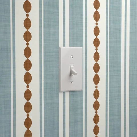 Custom Printed Vinyl Wall Covering With A Subtle Leather Look And Modern Stripe Pattern Great For Commercial Spots Or Home Hangouts close-up of blue stripe pattern and light switch