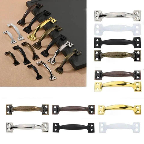 Assorted vintage door pulls including Vintage Five Inch Door Pulls 2 Pack Bow Shaped Gate Handles In Red Bronze Finish on display.